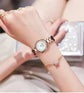 CURREN Luxury Watch Women Ring Necklace displayed on a women&